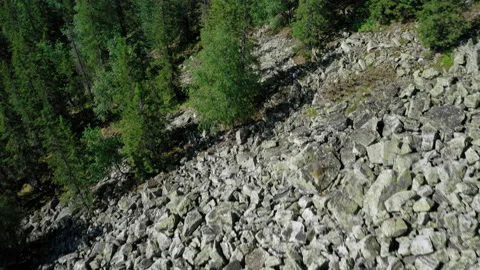 Aerial view of Suka mountain range in Ural, drone flies near stones and boulders Stock Footage 138005650