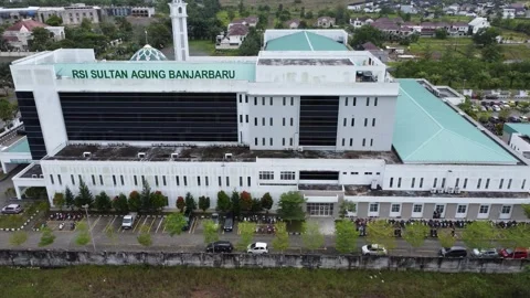 Aerial view of the Sultan Agung Islamic Hospital building in Banjarmasin Stock Footage 328971754