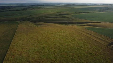 Aerial view of summer fields being, farmland and country landscape Stock Photos
