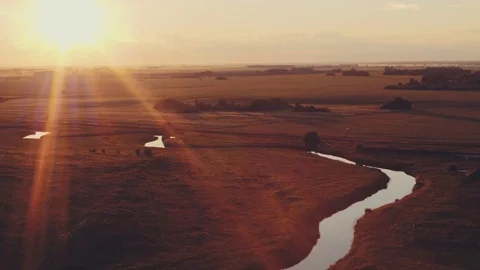 Aerial view of the summer sunset over the field and the river Video stock 85422482