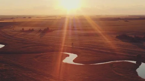 Aerial view of the summer sunset over the field and the river 動画素材 85422970