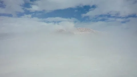 Aerial view of the summit in the clouds Stock Footage 243028171