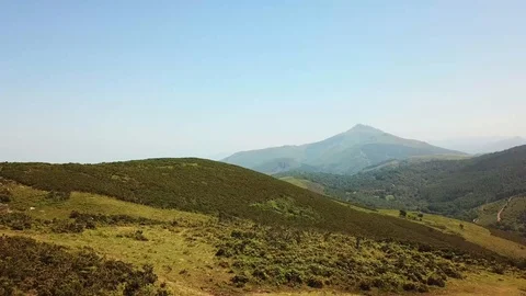 Aerial view of the summit of a mountain in the Pyrenees on a sunny day Stock Footage 93956822