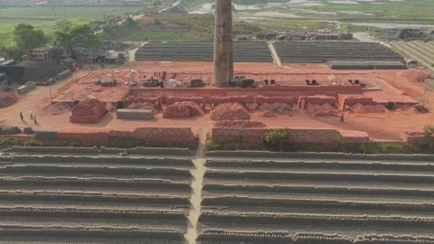 Aerial view of sun-drying bricks at traditional brick factory in Bangladesh Stock Footage 325370625