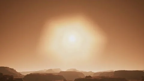 Aerial view with the sun in front of the red Martian desert surface on Mars Video stock 245819225