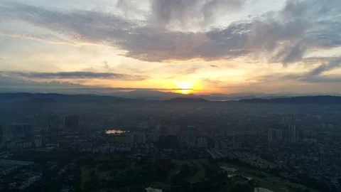 Aerial view. Sun light unveiling the city landscape in the morning. Видео 81492874