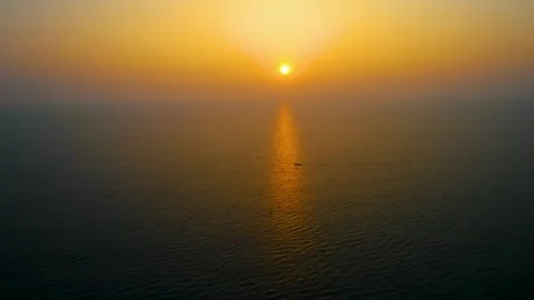 Aerial view of sun path is reflected in sea surface. Stock-Footage 261951258