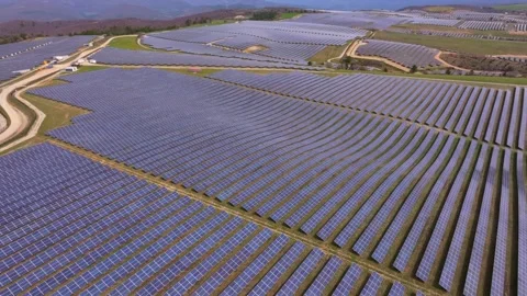 Aerial view of sun-powered grid on French mountain landscape Stock Footage 310690518