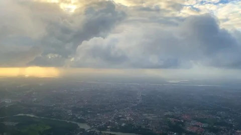 Aerial view. Sun rays bursting from thick cloud formation. Видео 125061576