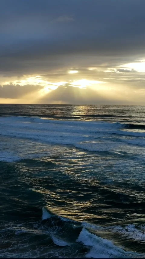 Aerial view of sun rays over Vale Figueiras Beach, Portugal. Stock Footage 337178521