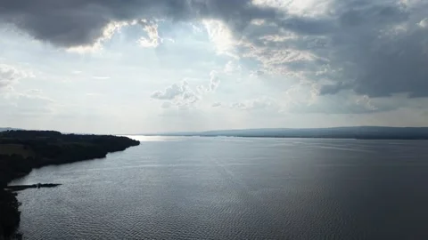 Aerial View of Sun Rays Over Lough Derg Under Dramatic Clouds, Ireland 스톡 동영상 339743682
