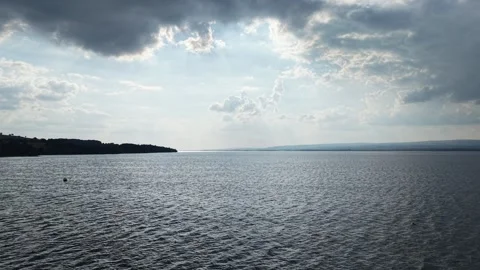 Aerial View of Sun Rays Over Lough Derg Under Dramatic Clouds, Ireland Видео 339743698