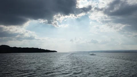 Aerial View of Sun Rays Over Lough Derg Under Dramatic Clouds, Ireland Video stock 339744025