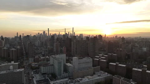 Aerial view of the sun setting over Manhattan Stock Footage 254218565