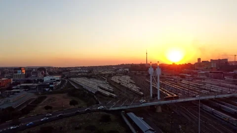 An aerial view of the sun setting over Newtown, Johannesburg Stock Footage 289751783