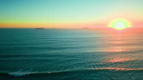 Aerial view of the sun setting over the Atlantic Ocean Stock Footage 342743716