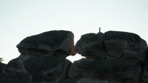 Aerial view of the sun through the rock Stock Footage 146490576