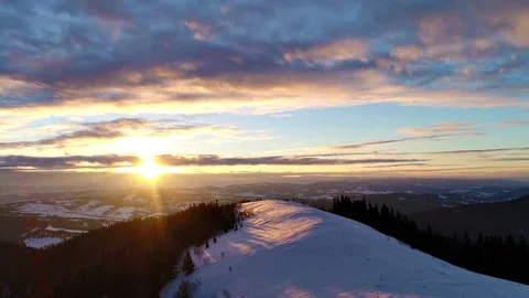 Aerial view in sundown winter mountain Stock Footage