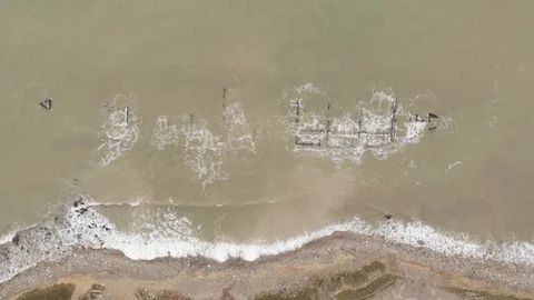 Aerial view of the sunken cargo vessel during surf of the Black Sea. Stock Footage 101306022