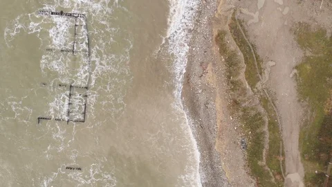 Aerial view of the sunken vessel during surf. Stock Footage 101307329
