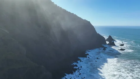 Aerial View of Sunlight Falling on Rugged Coastline of Southern Oregon Stock Footage 233998992