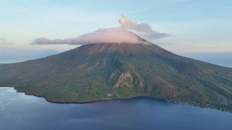 Aerial View of Sunlit Cloud Above Scenic Volcano in Indonesia Stock Footage 280003372