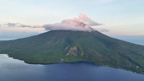 Aerial View of a Sunlit Cloud Atop a Scenic Volcano in the Ring of Fire Vidéo 279661590