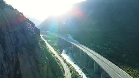 Aerial View of a Sunlit Highway Symbolizing Hope and the Journey Forward Stock Footage 341876301