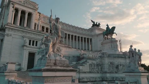 Aerial view of sunlit statues in front of the Altar of the Fatherland, Stock Footage 185438929