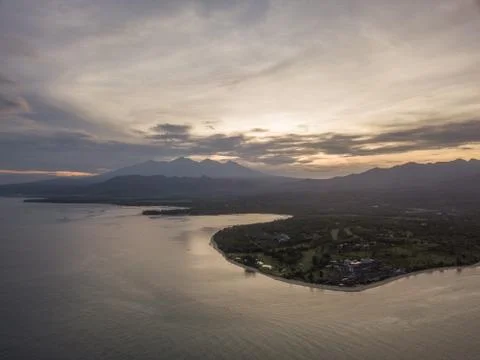 Aerial view of sunrise with Lombok in background Stock Photos