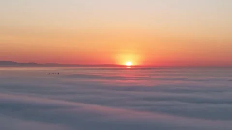 Aerial view of sunrise over clouds near Europa Point, Gibraltar. Stock Footage 346643326