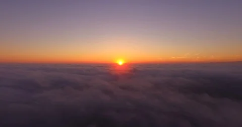 Aerial view of sunset above the clouds Stock Footage 85653564