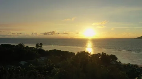 Aerial view of sunset on beach Anse La Reunion, La Digue Island, Seychelles Stock Footage 100371310