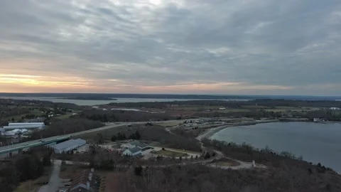 Aerial view of sunset, beach, jungle and highway in Rhode Island, USA Stock Footage 232393946