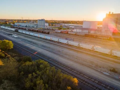 Aerial view at sunset of cargo train yard Stock Photos
