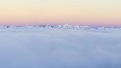 Aerial View of Sunset Cloud Sea and Mountain Peaks in Zhongba County, Tibet Stock Footage 340774004