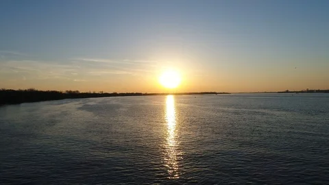 Aerial View of Sunset on the Delaware River Philadelphia, Pennsylvania Stock Footage 121822925