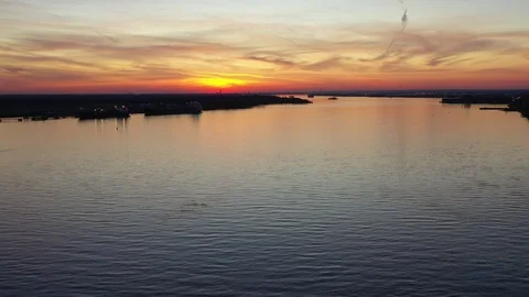 Aerial View of Sunset on the Delaware River Philadelphia, Pennsylvania Stock Footage 121863924