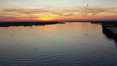 Aerial View of Sunset on the Delaware River Philadelphia, Pennsylvania Stock Footage 121863930
