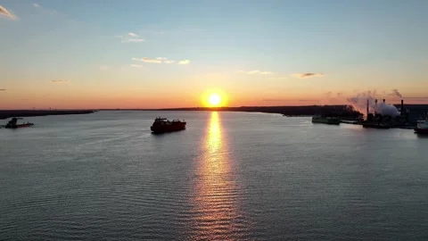Aerial View of Sunset on Delaware River with Cargo Ship Stock Footage 170102002
