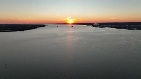 Aerial View of Sunset on Delaware River in Marcus Hook, Pennsylvania Stock Footage 230765490