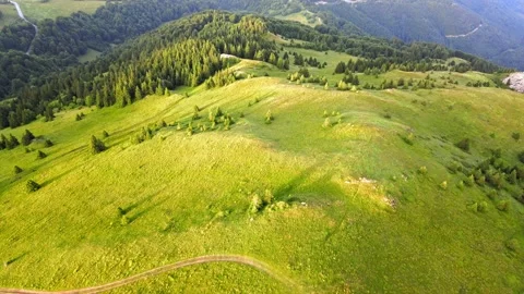 Aerial View. Sunset. Flight Over A Green Grassy Hills. Kopaonik, Serbia. Stock Footage 168969792