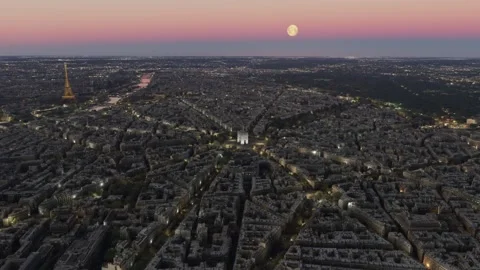 Aerial view at sunset with full moon of the city of Paris. France Stock Footage 271713203