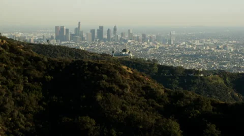 Aerial view at sunset of Griffith Observatory in California Hills 動画素材 64784144