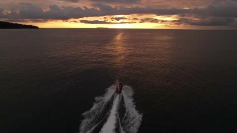 	aerial view, sunset with jetski Stock Footage 234583396
