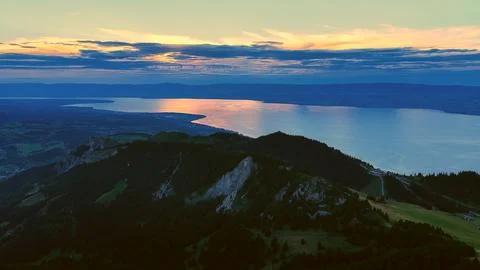 Aerial View Sunset Light Over Lake and Mountain Ridge Photos