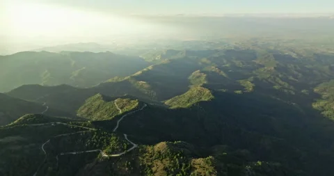 Aerial view of the sunset on the mountain ranges. Stock Footage 244150224
