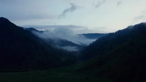 Aerial view of sunset in the mountains Stock Footage 317743389