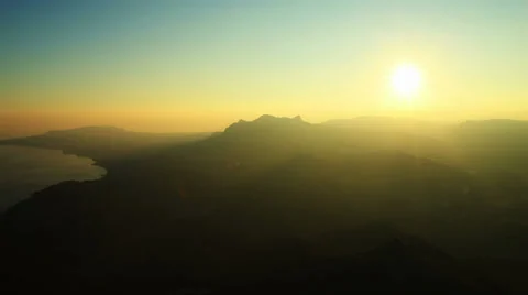 Aerial View: Sunset in the mountains. Kara Dag Mountain. Crimea, Ukraine Stock Footage 35540376