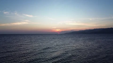 Aerial view of sunset on the ocean Stock Footage 252996932